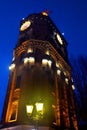 Old fire tower with clock at night in Vinnytsia, Ukraine