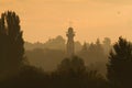 Old fire tower. Rarity. Dawn. The sun rises over the old city Royalty Free Stock Photo