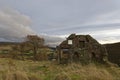 The old Fireplace, Chimney and Windows of a Scottish Cottage ruin.