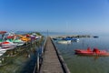 old fish boats and paddle boats next to the pier at Lake Balaton in Hungary Royalty Free Stock Photo