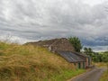 The Old Fish and ice house hidden in the Verge at the main of Kinnaber near to Montrose Royalty Free Stock Photo