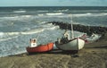 Old fishboats on rocky Jutland coast Royalty Free Stock Photo