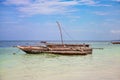 Old fisher boats on the beach during low tide on ocean Royalty Free Stock Photo