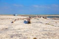 Old fisher boats on the beach during low tide on ocean Royalty Free Stock Photo