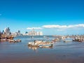 Old fisher boats and modern skyscraper skyline, Panama City Royalty Free Stock Photo