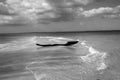 Old fisherman boat at sand bank