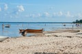 Old fisherman boat at sunrise time on the beach