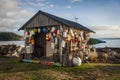 Old Fisherman`s Shack Covered in Crab Buoys Decorated for the Holiday Season.