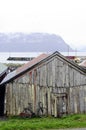 Fishermen Old Log Cabin, Bike and Harbor_Norway Royalty Free Stock Photo