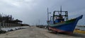 Old Fishing Boat Aground At Fishing Port