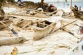 Africa, Tanzania, island of Zanzibar. Old fishing boat on beach Royalty Free Stock Photo