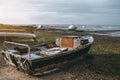 An old fishing boat with a cabin