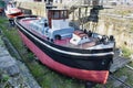 Old fishing boat in dry dock of the Bilbao Maritime Museum Royalty Free Stock Photo