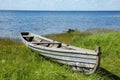 Old fishing boat on the lake bank Royalty Free Stock Photo