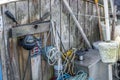 Old fishing boat made of wood, the boat is filled with different fishing gear. bouy flag stands in the side