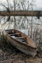 old fishing boat on the river bank Royalty Free Stock Photo