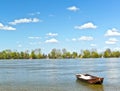 Old fishing boat on river spring blue sunny day Danube Serbia Zemun Gardos Kej