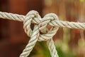 Old fishing boat rope with a Tied Knot Royalty Free Stock Photo