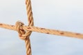 Old fishing boat rope with a Tied Knot Royalty Free Stock Photo