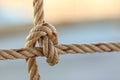 Old fishing boat rope with a Tied Knot Royalty Free Stock Photo