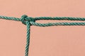 Old fishing boat rope with a Tied Knot Royalty Free Stock Photo