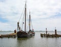 Old fishing boat sails into the harbor of Volendam Netherlands Royalty Free Stock Photo