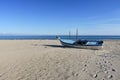 Old fishing boat on sandy beach Royalty Free Stock Photo