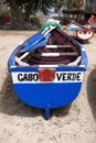 Old fishing boat on the shore. Boat with nets waiting for fishermen on the beach of Cape Verde