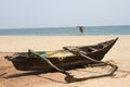 Old fishing boat standing on the sandy beach. India, Goa Royalty Free Stock Photo