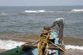 Old fishing boat standing on the sandy beach. India, Goa Royalty Free Stock Photo