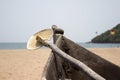 Old fishing boat standing on the sandy beach. India, Goa Royalty Free Stock Photo