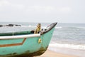 Old fishing boat standing on the sandy beach. India, Goa Royalty Free Stock Photo