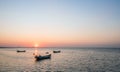 Old fishing boat at sunset time Royalty Free Stock Photo