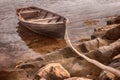 An old fishing boat is tethered near the shore of the White Sea. Selected focus. Toning Royalty Free Stock Photo