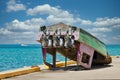 An Old Fishing Boat Upside Down on Dock Royalty Free Stock Photo