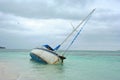 Old fishing boat washed up on the beach in Punta Cana