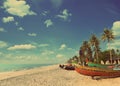 Old fishing boats on beach - vintage retro style Royalty Free Stock Photo