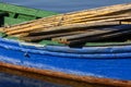 Old fishing boats with bright colors at dawn on the lake Royalty Free Stock Photo