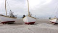 Old Fishing Boats Lined Up Ashore on Thorup Strand Beach in Denmark