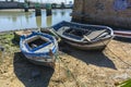 Old fishing boats on the shore of a river Royalty Free Stock Photo