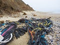 Old fishing nets and other garbage on the sea shore