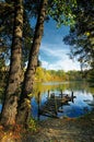 Old fishing platform on the fall lake