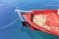 Old fishing red boat tied on dock Royalty Free Stock Photo