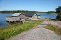 Fishing sheds and boats somewhere on the Aland Islands Royalty Free Stock Photo