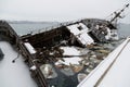 Old fishing ship sank at pier in port Royalty Free Stock Photo