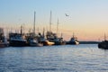 Old fishing trawlers at sunset Royalty Free Stock Photo