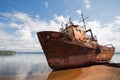 Old fishing vessel on the sea coast Royalty Free Stock Photo