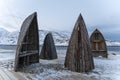 Teriberka is a village on the shore of the Arctic Ocean. The edge of the world. The far north of Russia. Wooden benches in the Royalty Free Stock Photo