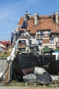 Old fishingboat on land