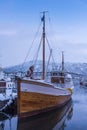 Old fishingboat TromsÃÂ¸ wintertime Royalty Free Stock Photo